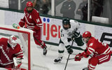 Michigan State and Wisconsin play hard in the third period in Munn Arena Saturday, Nov. 22, 2025. - Robert Killips, USA TODAY Sports