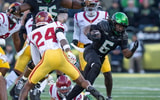 Oregon running back Noah Whittington carries the ball as the Oregon Ducks host the USC Trojans on Nov. 22, 2025, at Autzen Stadium in Eugene, Oregon