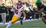 USC Trojans wide receiver Makai Lemon (6) catches a pass for a touch down during the first half against the Oregon Ducks at Autzen Stadium