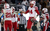 Nebraska football QB TJ Lateef (14) and RB Emmett Johnson (21) against Penn State