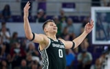Michigan State Spartans forward Jaxon Kohler (0) reacts after a three point basket against the East Carolina Pirates in the second half at Suncoast Credit Union Arena. - Nathan Ray Seebeck, USA TODAY Sports