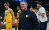Nov 25, 2025; Las Vegas, NV, USA; Michigan Wolverines head coach Dusty May reacts after a 2025 Players Era Festival group play game against the Auburn Tigers at Michelob ULTRA Arena. Mandatory Credit: Kirby Lee-Imagn Images
