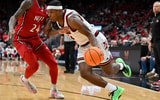 Nov 26, 2025; Louisville, Kentucky, USA; Louisville Cardinals guard Ryan Conwell (3) dribbles against NJIT Highlanders guard Ari Fulton (24) during the second half at KFC Yum! Center. Louisville defeated New Jersey Tech 104-47. Mandatory Credit: Jamie Rhodes-Imagn Images