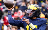 Michigan quarterback Bryce Underwood (19) warms up at Michigan Stadium in Ann Arbor on Saturday, Nov. 29, 2025.