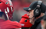 Nov 29, 2025; Louisville, Kentucky, USA; Louisville Cardinals head coach Jeff Brohm talks with quarterback Miller Moss (7) during the second half against the Louisville Cardinals at L&N Federal Credit Union Stadium. Louisville defeated Kentucky 41-0. Mandatory Credit: Jamie Rhodes-Imagn Images