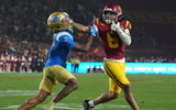 USC Trojans wide receiver Makai Lemon (6) carries the ball against UCLA Bruins defensive back Andre Jordan Jr. (2) in the second half at United Airlines Field at Los Angeles Memorial Coliseum
