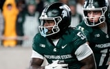Michigan State quarterback Alessio Milivojevic (11) hands the ball off to Michigan State running back Makhi Frazier (5) against Penn State in the third quarter at Spartan Stadium. - Brendan Mullin, USA TODAY Sports
