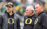 Oregon offensive coordinator Will Stein, left, former Oregon defensive coordinator Nick Aliotti and former Oregon coach Rich Brooks talk before the game as the Fighting Ducks face off against Mighty Oregon in the Oregon Ducks spring game on April 26, 2025, at Autzen Stadium in Eugene. (© Ben Lonergan/The Register-Guard / USA TODAY NETWORK via Imagn Images)