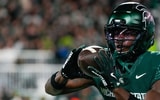 Michigan State Spartans wide receiver Nick Marsh (6) warms up prior to a game against the Michigan Wolverines at Spartan Stadium. - Brendan Mullin, USA TODAY Sports