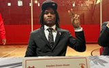 Kayden Dixon-Wyatt flashes the fight on after signing with the USC Trojans on national signing day