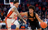 Dec 2, 2025; Syracuse, New York, USA; Tennessee Volunteers guard Ja’Kobi Gillespie (0) drives against Syracuse Orange guard Nate Kingz (4) during the first half at the JMA Wireless Dome. Mandatory Credit: Rich Barnes-Imagn Images
