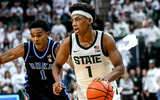 Michigan State's Jeremy Fears Jr., right, moves the ball as Duke's Caleb Foster defends during the second half on Saturday, Dec. 6, 2025, at the Breslin Center in East Lansing. - Nick King, USA TODAY Sports