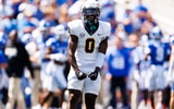Aug 30, 2025; Lexington, Kentucky, USA; Toledo Rockets defensive back Nasir Bowers (0) reacts after Toledo recovers a Kentucky Wildcats fumble during the second quarter at Kroger Field. Mandatory Credit: Jordan Prather-Imagn Images