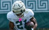 Michigan State's Tracy Revels (21) runs the ball at practice Tuesday, Aug. 5, 2025. - Robert Killips, USA TODAY Sports