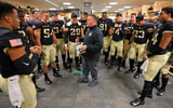 Nov 17, 2018; West Point, NY, USA; Army Black Knights defensive coordinator Jay Bateman speaks to his players in the locker room before a game against the Colgate Raiders at Michie Stadium. Mandatory Credit: Danny Wild-Imagn Images