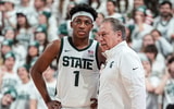 Michigan State guard Jeremy Fears Jr. talks to head coach Tom Izzo during the first half against Duke at Breslin Center in East Lansing on Saturday, Dec. 6, 2025. - Junfu Han, USA TODAY Sports
