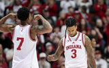 Dec 9, 2025; Bloomington, Indiana, USA; Indiana Hoosiers forward Nick Dorn (7) and guard Lamar Wilkerson (3) celebrate after a play during the second half against the Penn State Nittany Lions at Simon Skjodt Assembly Hall. Mandatory Credit: Robert Goddin-Imagn Images