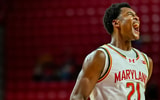Maryland-forward-Pharrel-Payne-helped-off-court-after-suffering-injury vs-Michigan