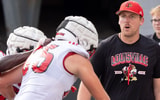 University of Louisville tight ends coach Ryan Wallace runs a drill during their second practice on Friday, Aug. 2, 2024 at L&N Federal Credit Union Stadium.