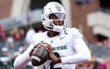 Michigan State Spartans quarterback Aidan Chiles (2) warms up before the game against the Minnesota Golden Gophers at Huntington Bank Stadium. - Matt Krohn, USA TODAY Sports