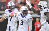 The James Madison defense celebrates against Louisville, via Jamie Rhodes-Imagn Images