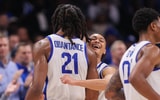 Dec 20, 2025; Atlanta, Georgia, USA; Kentucky Wildcats forward Jayden Quaintance (21) reacts with St. John Red Storm guard Jaland Lowe (15) in the second half at State Farm Arena. Mandatory Credit: Brett Davis-Imagn Images