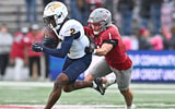 Oct 25, 2025; Pullman, Washington, USA; Toledo Rockets wide receiver Junior Vandeross III (2) makes a catch against Washington State Cougars safety Tucker Large (1) in the second half at Gesa Field at Martin Stadium. Mandatory Credit: James Snook-Imagn Images