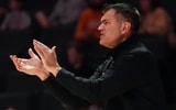 Gardner-Webb basketball coach Jeremy Luther encouraging his team during an NCAA college basketball game against Tennessee on Dec. 21, 2025, in Knoxville, Tennessee.