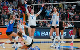 The Kentucky volleyball team celebrates a Final Four win over Wisconsin, via Jay Biggerstaff-Imagn Images