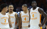 Dec 21, 2025; Knoxville, Tennessee, USA;  Tennessee Volunteers guard Bishop Boswell (3) and guard Amari Evans (1) and guard Clarence Massamba (4) and forward Dewayne Brown II (6) during the first half against the Gardner-Webb Runnin' Bulldogs at Thompson-Boling Arena at Food City Center. Mandatory Credit: Randy Sartin-Imagn Images