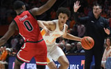 Dec 21, 2025; Knoxville, Tennessee, USA;  Tennessee Volunteers forward Nate Ament (10) moves the ball against Gardner-Webb Runnin' Bulldogs guard Jamias Ferere (0) during the first half at Thompson-Boling Arena at Food City Center. Mandatory Credit: Randy Sartin-Imagn Images