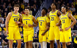 Michigan Wolverines basketball's Will Tschetter, Trey McKenney, L.J. Cason, Morez Johnson Jr. and Roddy Gayle Jr. (Photo by Rick Osentoski-Imagn Images)