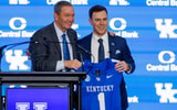 Mitch Barnhart presents a Kentucky jersey to new head football coach Will Stein, via Crawford Ifland, KSR