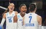 Kentucky's middle blocker Jordyn Dailey (5) celebrates with Eva Hudson (7) and Lizzie Carr (15) against Cal Poly Thursday in Historic Memorial Coliseum. Dec. 11, 2025 | Scott Utterback/Courier Journal / USA TODAY NETWORK via Imagn Images