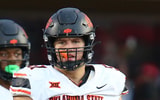 Oct 25, 2025; Lubbock, Texas, USA; Oklahoma State Cowboys offensive lineman Austin Kawecki (51) waits to snap the ball against the Texas Tech Red Raiders in the second half at Jones AT&T Stadium. Mandatory Credit: Michael C. Johnson-Imagn Images