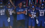 Kansas Jayhawks head coach Lance Leipold brings his team out before the game between Fresno State and Kansas at David Booth Kansas Memorial Stadium. (© Evert Nelson/The Capital-Journal / USA TODAY NETWORK via Imagn Images)