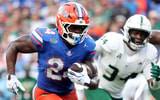 Sep 6, 2025; Gainesville, Florida, USA; Florida Gators running back Ja'Kobi Jackson (24) runs with the ball against the South Florida Bulls during the second quarter at Ben Hill Griffin Stadium. Mandatory Credit: Kim Klement Neitzel-Imagn Images
