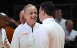 Jan 6, 2026; Knoxville, Tennessee, USA;  Tennessee Volunteers head coach Rick Barnes and Texas Longhorns head coach Sean Miller meet before the game at Thompson-Boling Arena at Food City Center. Mandatory Credit: Randy Sartin-Imagn Images
