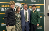 New St. Xavier head football coach Brian Landis and family - Preston Harvey, WLKY