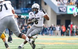 Nov 8, 2025; Morgantown, West Virginia, USA; Colorado Buffaloes wide receiver Dre'Lon Miller (6) runs the ball during the second quarter against the West Virginia Mountaineers at Milan Puskar Stadium. Mandatory Credit: Ben Queen-Imagn Images