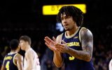 Michigan Wolverines basketball guard Elliot Cadeau scored 17 points in a win at Oregon. (Photo by Rick Osentoski-Imagn Images)