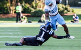 Sep 28, 2024; Durham, North Carolina, USA; Duke Blue Devils safety Terry Moore (1) tackles North Carolina Tar Heels running back Omarion Hampton (28) with the ball during the first half of the game against at Wallace Wade Stadium. Mandatory Credit: Jaylynn Nash-Imagn Images