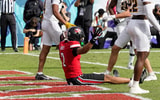 Dec 23, 2025; Boca Raton, FL, USA;Louisville Cardinals wide receiver Treyshun Hurry (2) celebrates a touchdown reception against the Toledo Rockets in the first quarter at Flagler CU Stadium. Mandatory Credit: Jeff Romance-Imagn Images