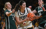 The Hawkeyes defeated the 15th-ranked Spartans on Sunday night. (Photo by Dennis Scheidt)