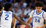 Nov 7, 2025; Lexington, Kentucky, USA; Kentucky Wildcats center Malachi Moreno (24) celebrates with guard Jasper Johnson (2) after dunking the ball during the first half against the Valparaiso Beacons at Rupp Arena at Central Bank Center. Mandatory Credit: Jordan Prather-Imagn Images