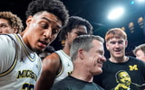 Michigan Wolverines basketball head coach Dusty May, forward Yaxel Lendeborg and team after a win over Indiana. (Photo by Junfu Han / USA TODAY NETWORK via Imagn Images)