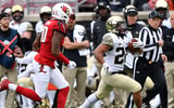 Oct 27, 2018; Louisville, KY, USA; Wake Forest Demon Deacons running back Matt Colburn (22) runs the ball against Louisville Cardinals cornerback Rodjay Burns (10) during the second half at Cardinal Stadium. Wake Forest defeated Louisville 56-35. Mandatory Credit: Jamie Rhodes-Imagn Images