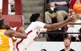 Jan 24, 2026; Tuscaloosa, AL, USA; Alabama center Charles Bediako (14) reaches out to grab a rebound against Tennessee forward Dewayne Brown II (6) at Coleman Coliseum. Mandatory Credit: Gary Cosby Jr.-Tuscaloosa News