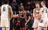 Michigan State Spartans forward Jaxon Kohler (0) reacts with center Carson Cooper (15) after scoring a basket during overtime against the Rutgers Scarlet Knights at Jersey Mike's Arena. - Vincent Carchietta, USA TODAY Sports