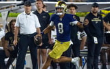 Sep 20, 2025; South Bend, Indiana, USA; Notre Dame Fighting Irish quarterback Kenny Minchey (8) scrambles against the Purdue Boilermakers in the second half at Notre Dame Stadium. Mandatory Credit: Michael Caterina-Imagn Images